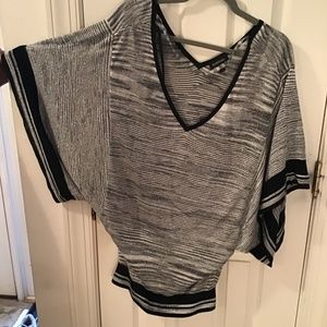 Black and silver batwing tunic